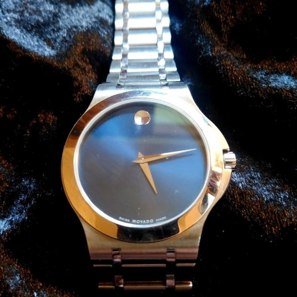 Movado men's blue face watch  sapphire crystal
